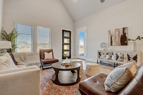 a living room with a couch and a table